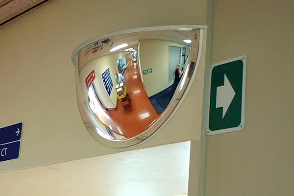 DuraVision Hospital Safety Mirror mounted at a busy medical corridor intersection