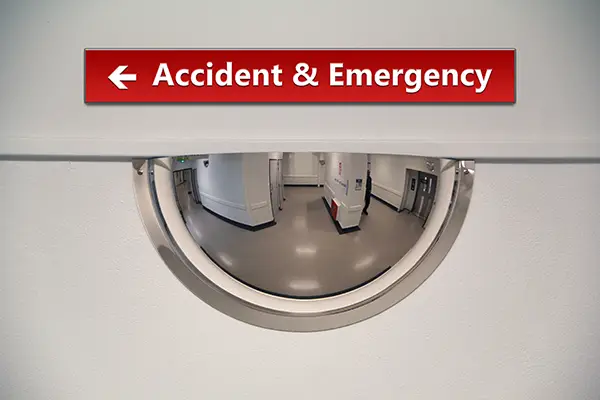 DuraVision Hospital Safety Mirror mounted at a busy medical corridor intersection