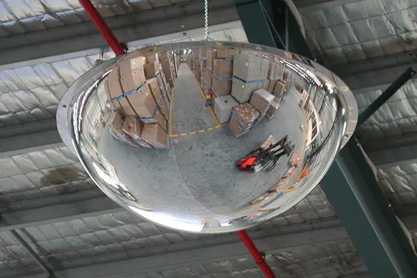 Industrial Safety Mirror managing heavy forklift traffic in a warehouse zone